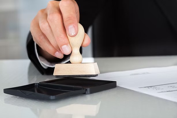 A stamp coming down on a court document